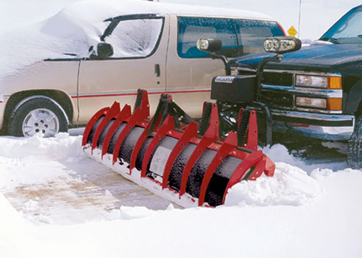 Hiniker Backdrag Plow Clearing A Parking Space